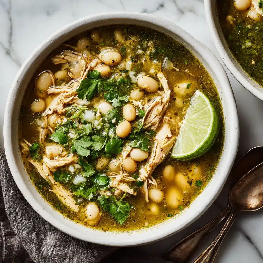 Chicken Posole Verde: A Flavorful, Easy Recipe 2 A close-up shot of a bowl of spicy green pozole with chicken, highlighting the texture of the hominy and shredded chicken in the flavorful tomatillo broth.